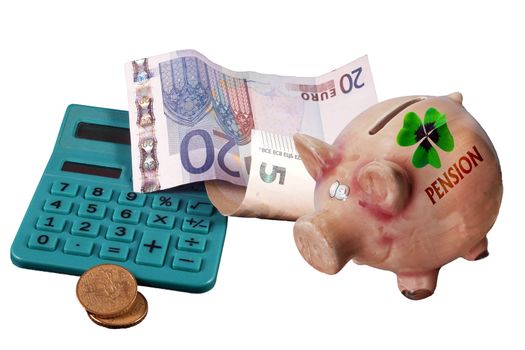 Euro bundle and a calculator and piggy bank.Cconcept pension or pension. Save money for retirement.