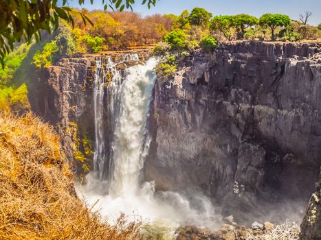 Victoria Falls on Zambezi River. Dry season. Border between Zimbabwe and Zambia, Africa.