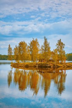 Small Island with a House among Birches in the Middle of the Daugava River, Latvia