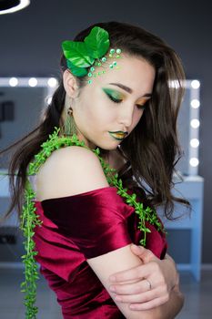 Fashion Brunette Model Portrait. Hairstyle. Haircut. Professional Makeup False Eyelashes