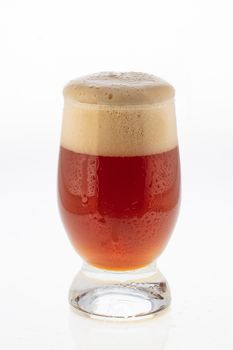 Glass of beer on an isolated studio background