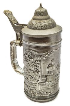 Pewter beer mug with sculpted design