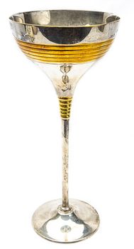 Long stem silver goblet with gold trim