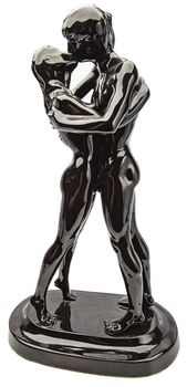 Black glossy ceramic statue of a nude couple kissing