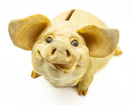 Smilling pig piggybank isolated on a white background