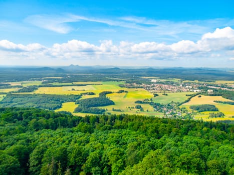 Rural landscape around Mimon on sunny summer day, view from Ralsko mountain, Czech Republic.