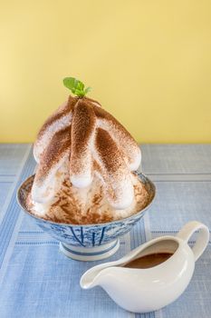 Bingsu - Korean shaved ice dessert with sweet toppings with chocolate