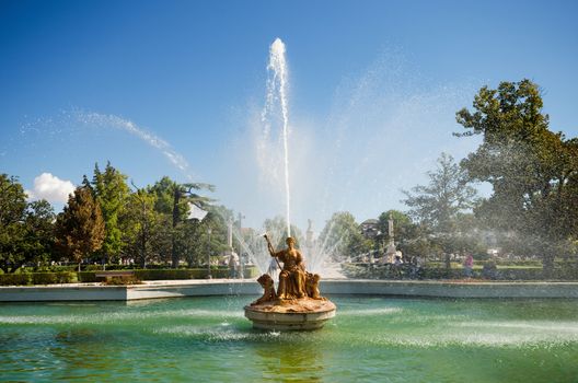 Fountain and gardens of Aranjuez Royal palace in Madrid, Spain.