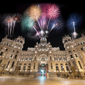 Cibeles Palace night scene fireworks display celebration, (Palacio de Cibeles) is the City Hall of Madrid.