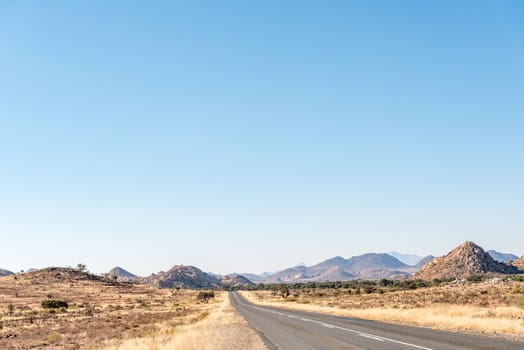 The B1 road between Grunau and Keetmanshoop in the Karas Region of Namibia. The Great Karas Mountains is in the back