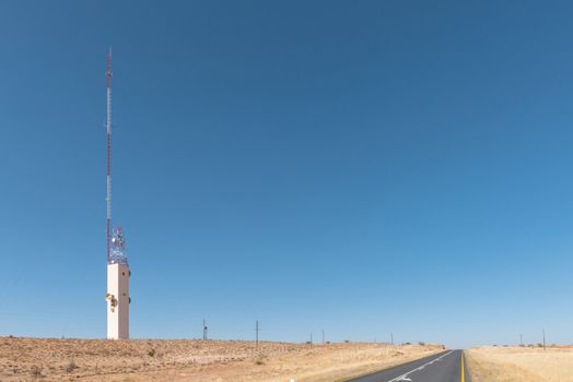 A microwave telcommunications tower and a cell phone tower near Kalkrand, a village on the B1-road between Mariental and Rehoboth