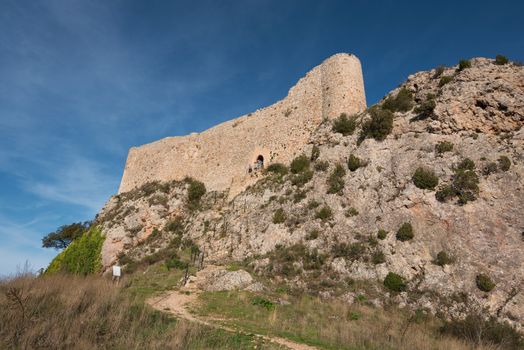 Tourist visiting Medieval castle in Poza de la Sal, Burgos, Spain.