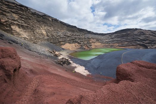 Volcanic green lake (El charco de los clicos) in Lanzarote, Canary islands, Spain.