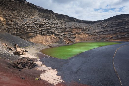 Volcanic green lake (El charco de los clicos) in Lanzarote, Canary islands, Spain.