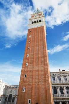 Venice famous landmark. St Mark's Campanile (Campanile di San Marco, ninth century) - famous bell tower of St Mark's Basilica, in st Marks square, Venice, Italy.