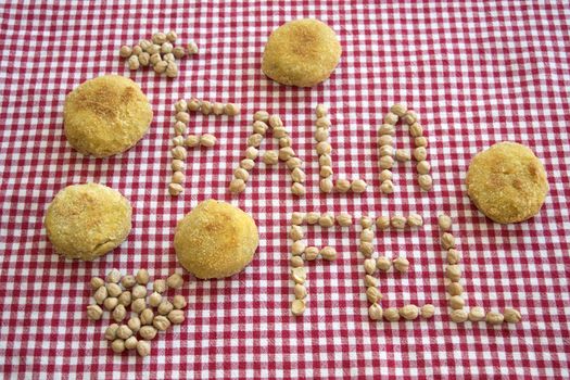 fried vegetarian falafel with near its written made with chickpeas