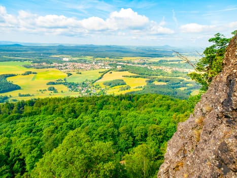 Rural landscape around Mimon on sunny summer day, view from Ralsko mountain, Czech Republic.