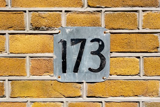 House number one hundred and seventy three (173)