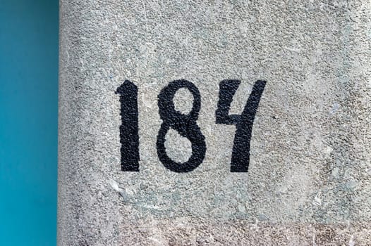 House number one hundred and eighty four (184)