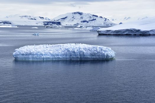 Stock pictures of ice on the ocean and mountains