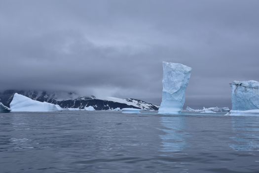 Stock pictures of ice on the ocean and mountains