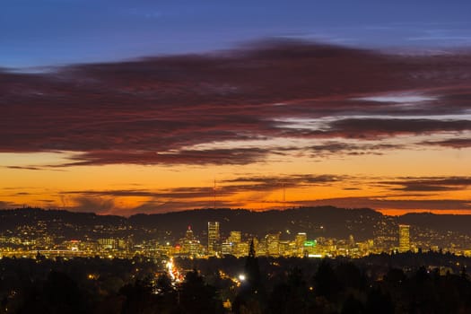 Dramatic sunset sky over the city of Portland Oregon downtown skyline
