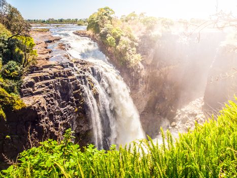 Victoria Falls on Zambezi River. Dry season. Border between Zimbabwe and Zambia, Africa.