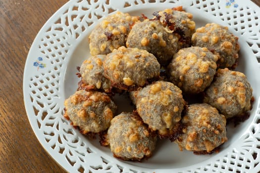 Homemade food, meat balls with cheese.