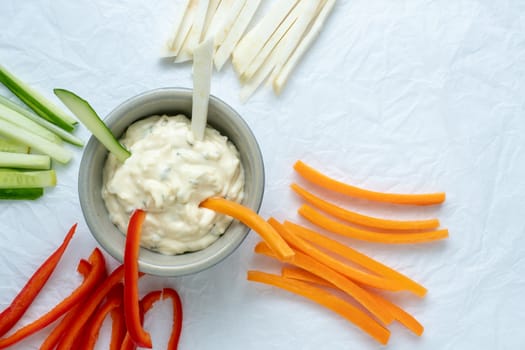 Healthy vegetables and dip snack. Vegetable sticks and dips in bowl.