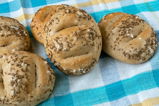 Bread rolls sprinkled with salt and caraway