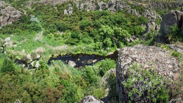 Panoramic view of Aktovskiy Canyon, Nikolayev region, Ukraine. River Mertvovod in a sunny summer day. One of natural wonders of Europe