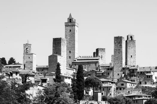 San Gimignano - medieval town with many stone towers, Tuscany, Italy. Panoramic view of cityscape. Black and white image.