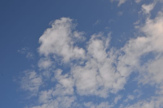 White Clouds in a clear blue sky