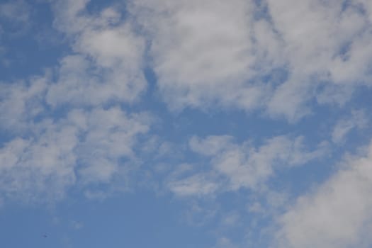 White Clouds in a clear blue sky