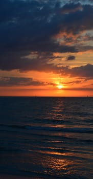 Sunset in the evening on a sea beach