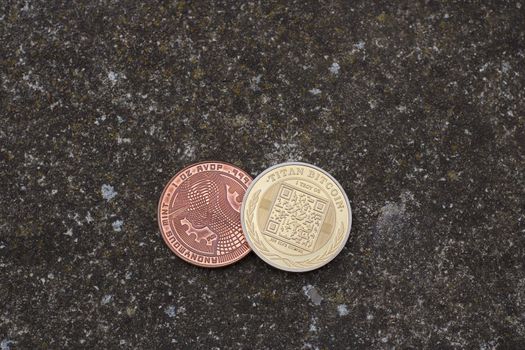 Digital currency physical bitcoin coin on the dark background. Anonymous mint.