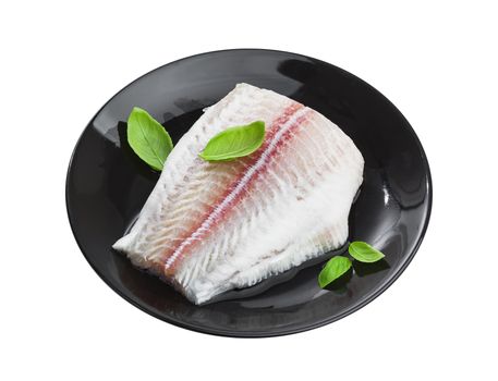 Fresh fish fillet of pangasius on plate isolated on white background with clipping path