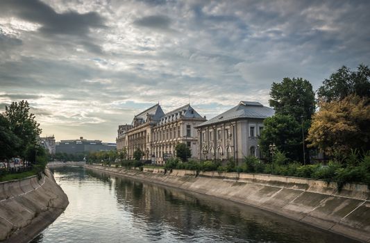 BUCHAREST, ROMANIA - 07.20.2018. Dambovita river in Bucharest in a cloudy summer day