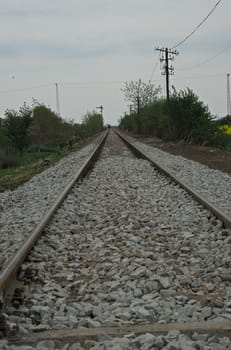 Railway tracks with white stones covering it