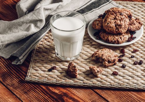 Milk with Oatmeal Cookies and Small Pieces of Cookies