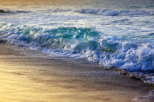 Wave crashes on to the shore. Caribian sea