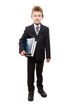 Handsome smiling child boy in business suit hand holding education reading books heap white isolated