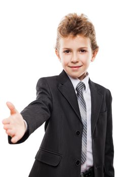Little smiling child boy in business suit gesturing hand greeting or meeting handshake white isolated