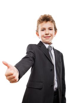 Little smiling young businessman child boy hand gesturing thumb up success sign white isolated