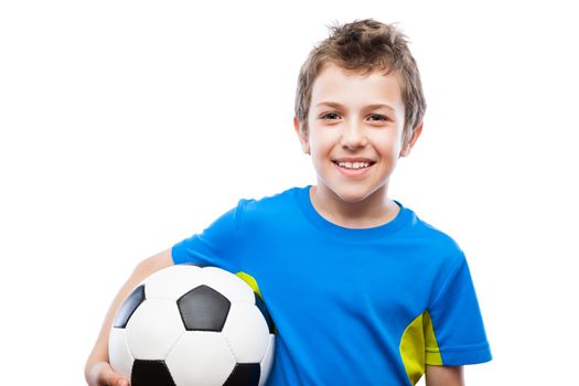 Handsome smiling child boy hand holding soccer ball white isolated