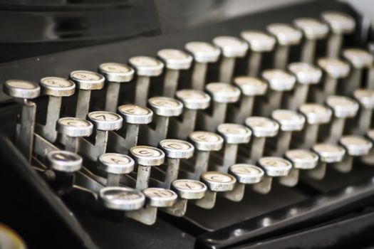 Antique typewriter keys close up, selective focus