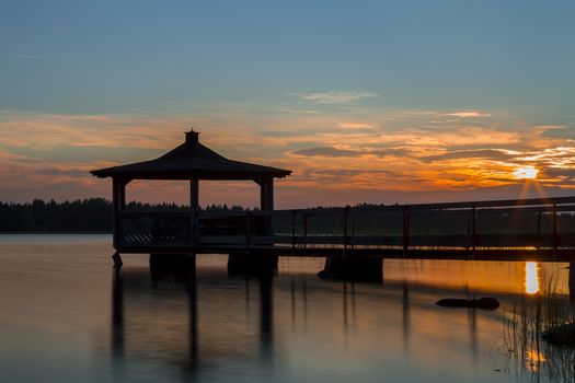 Gazebo in Lake wat Sunset.
