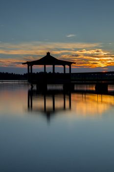 Gazebo in Lake wat Sunset.