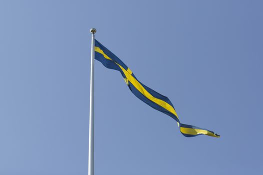 Swedish Pennant with a clear blue sky.