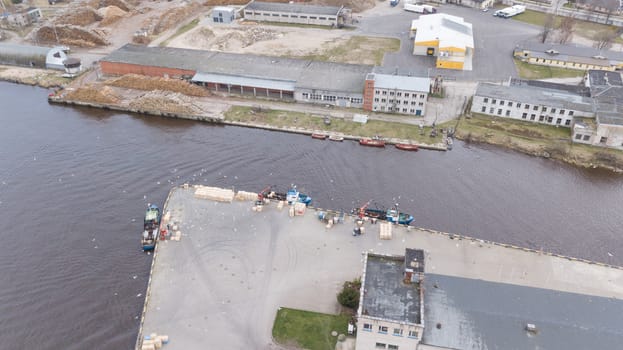 ship going in to Harbor Roja Latvia Aerial view of countryside drone top view